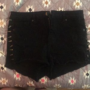 Side studded black shorts